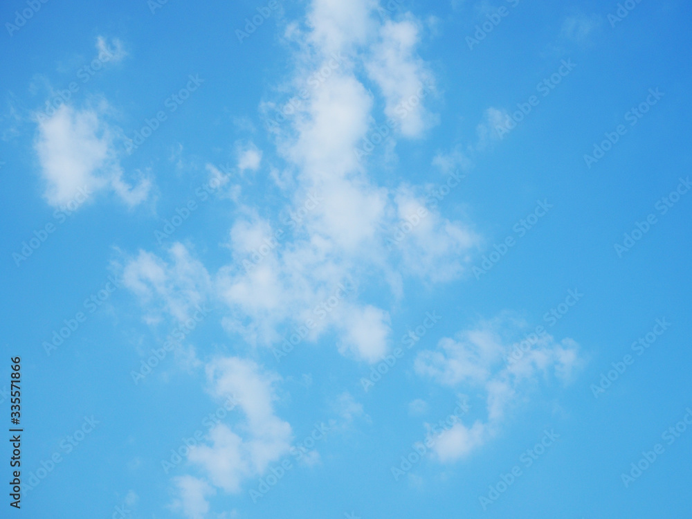 blue sky with white clouds close-up. Texture, template