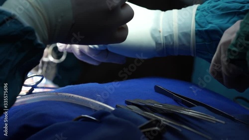 the hands of a surgeon