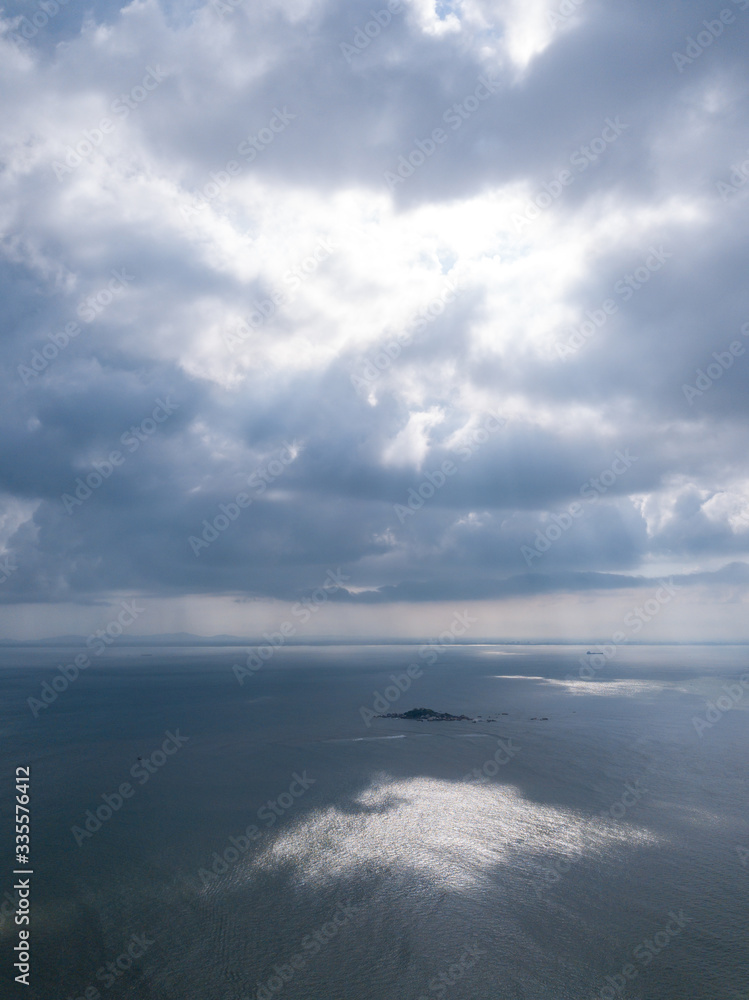 Aerial view sunray at Pulau Tikus, Penang during cloudy afternoon.