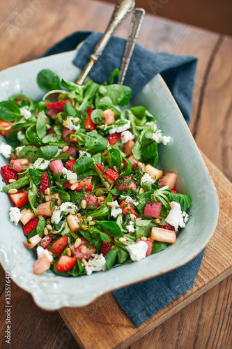 Healthy summer salad with strawberries