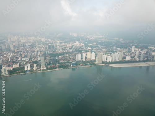 Aerial view Gurney Drive in misty day. © Cloudyew