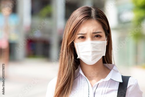 Asian woman with facial mask