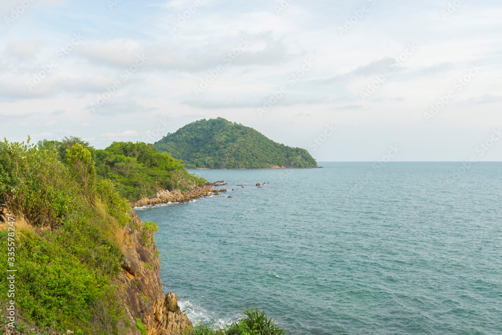Beautiful view point of tropical sea and island with mountain cliff and rocks in Noen Nangphaya View Point at Chalerm Burapha Chonlathit Highway, Chanthaburi, Thailand.