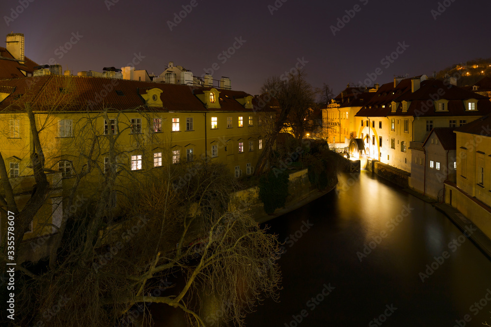 Night romantic Prague Flourmill above Certovka, Czech republic