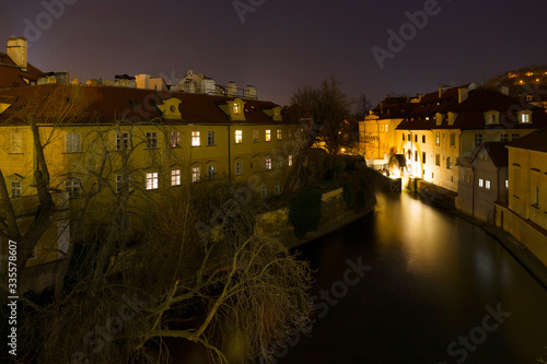 Night romantic Prague Flourmill above Certovka, Czech republic