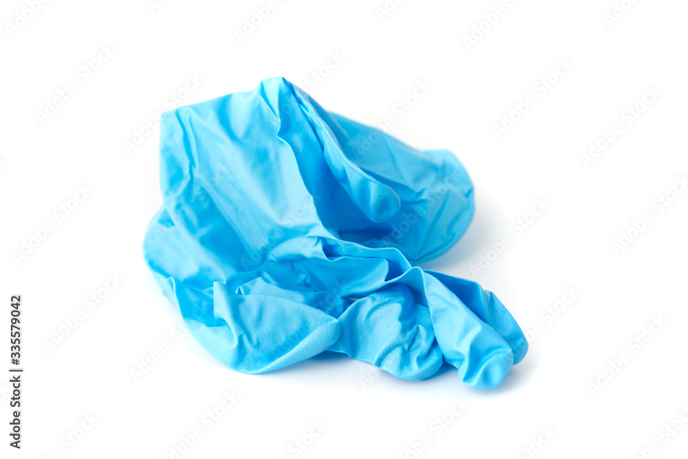 used blue gloves, example of healthcare waste, on white background, how to manage infection waste concept