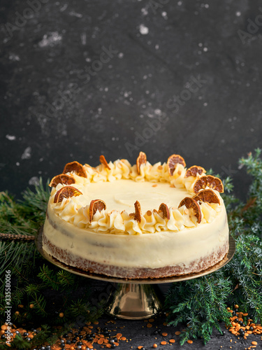  Orange flavoured christmas cake on a golden cake holder photo