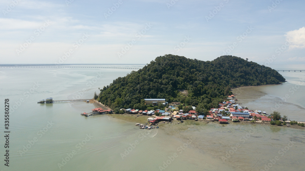 Aerial view fishing village at Pulau Aman Island.