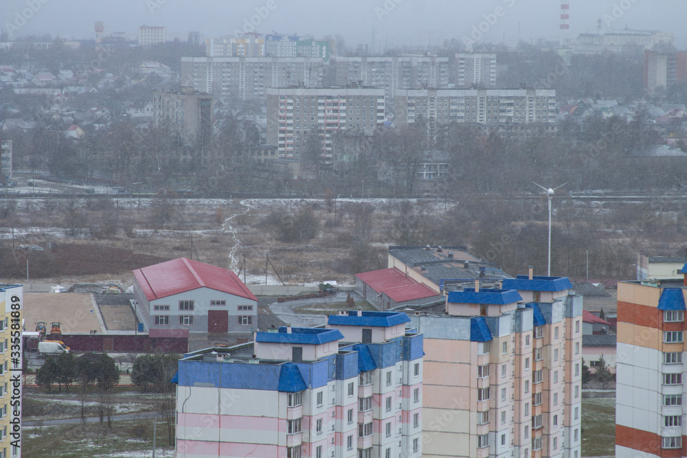 Multilevel mid-rise building, view from the top. Home ownership concept. friendly neighborhood Multilevel mid-rise building, view from the top. Home ownership concept. friendly neighborhood