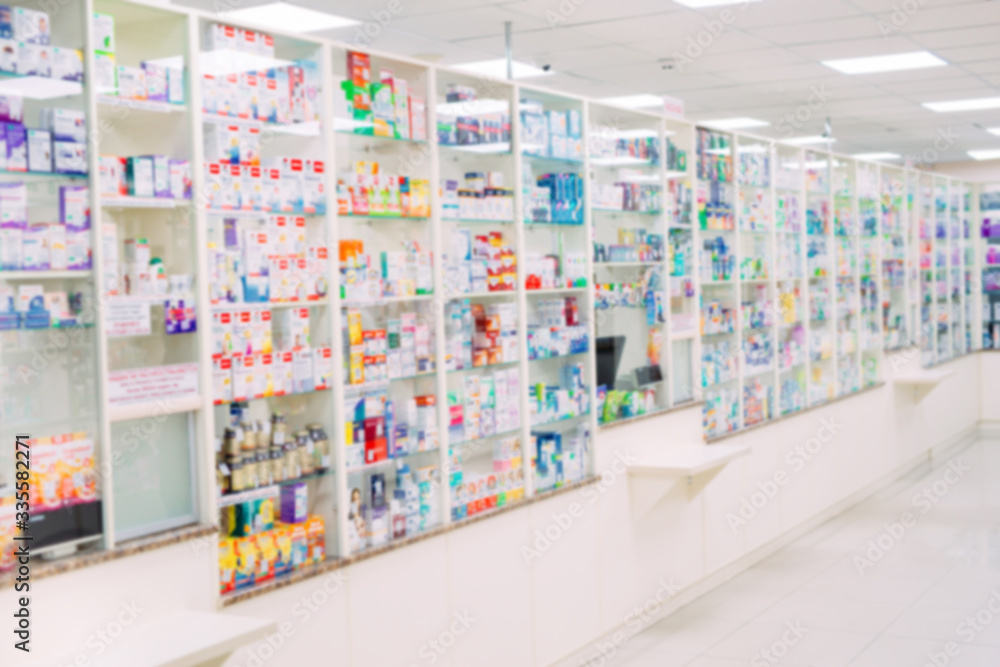 Obraz premium counter store table pharmacy background shelf blurred blur focus drug medical shop drugstore medication blank medicine pharmaceutics.