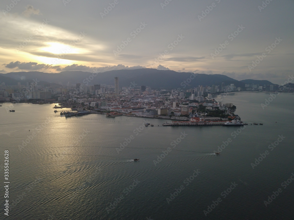 Aerial view two boats move at the sea of Penang island.