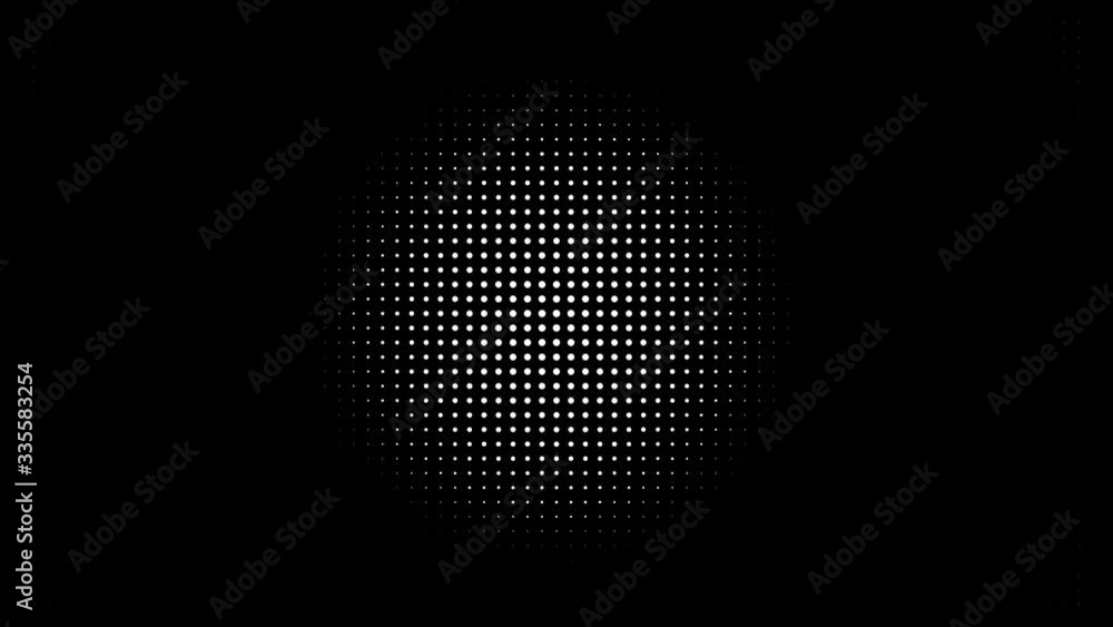 White polka dots against black background. Concentric growing circles seamless loop transition