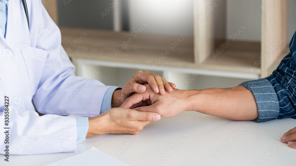 healthcare and medical ethics concept, doctor explains prescription to victim diagnosis giving a consultation and Patient listening intently in hospital. healthcare and medical ethics concept, doctor explains prescription to victim diagnosis giving a consultation and Patient listening intently in hospital.