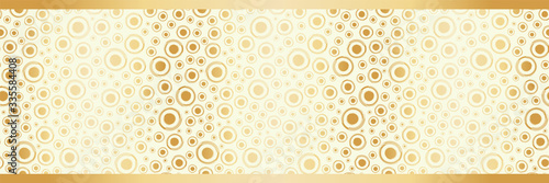 Gold foil circles seamless vector pattern border. Modern stylish dots metallic banner. Champagne bubble all over print for luxury ribbon, edge trim, celebration, Golden Wedding anniversary concept