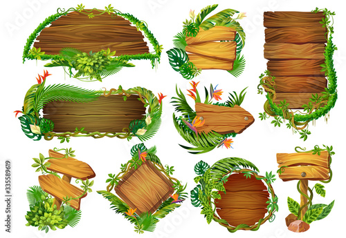 Cartoon wooden panels. Game pointers and info tables with tropical lianas and plants, sign boards in jungle forest. Vector illustration wooden label set on dark background