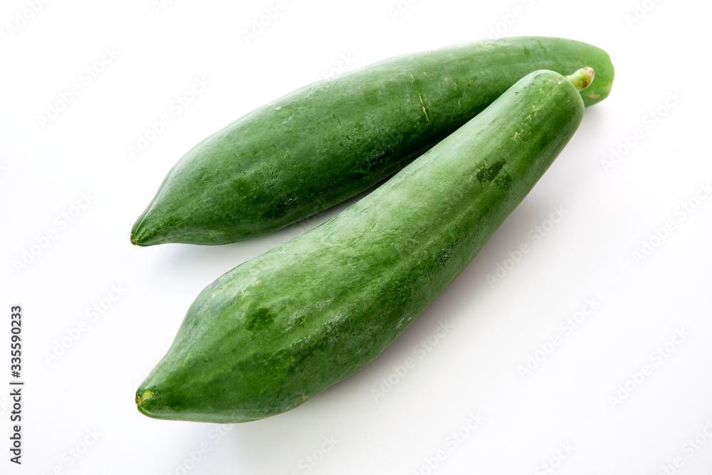 green papaya isolated on white background green papaya isolated on white background