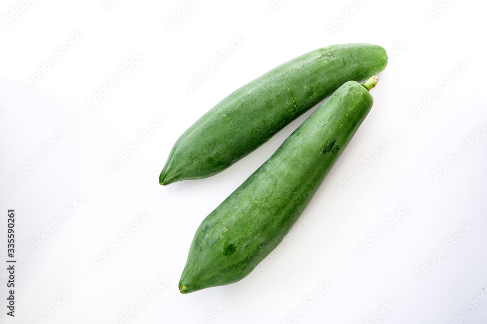 green papaya isolated on white background green papaya isolated on white background