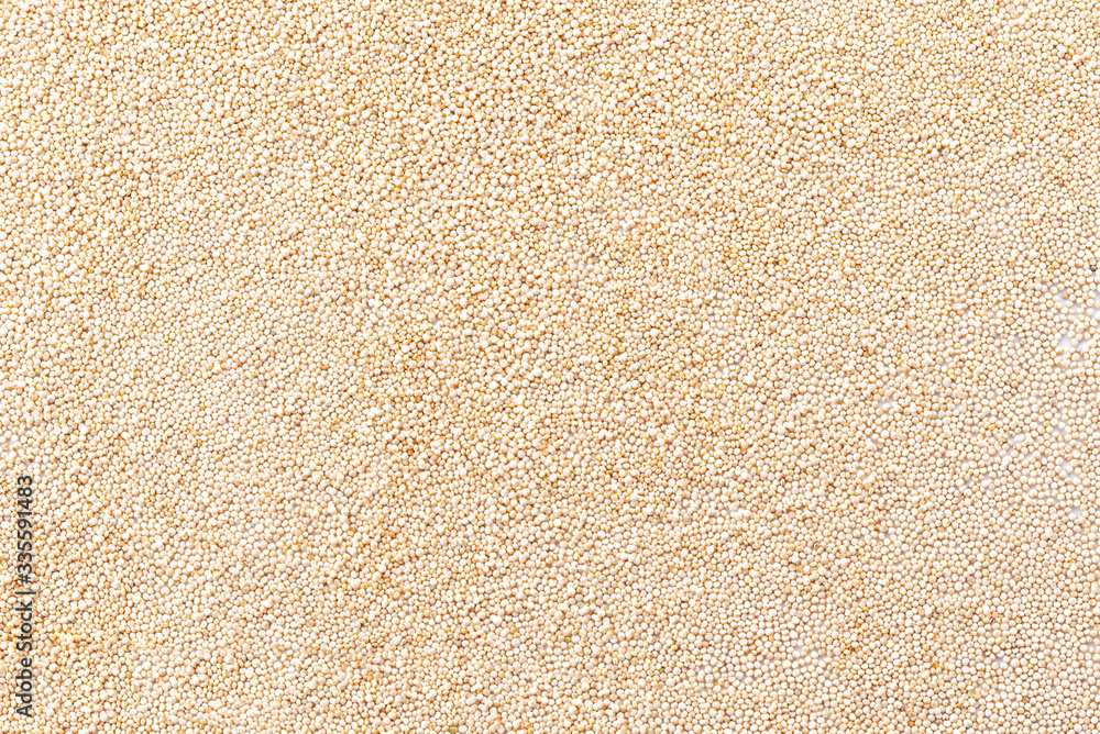 White Quinoa in bulk on a white background. White Quinoa in bulk on a white background.