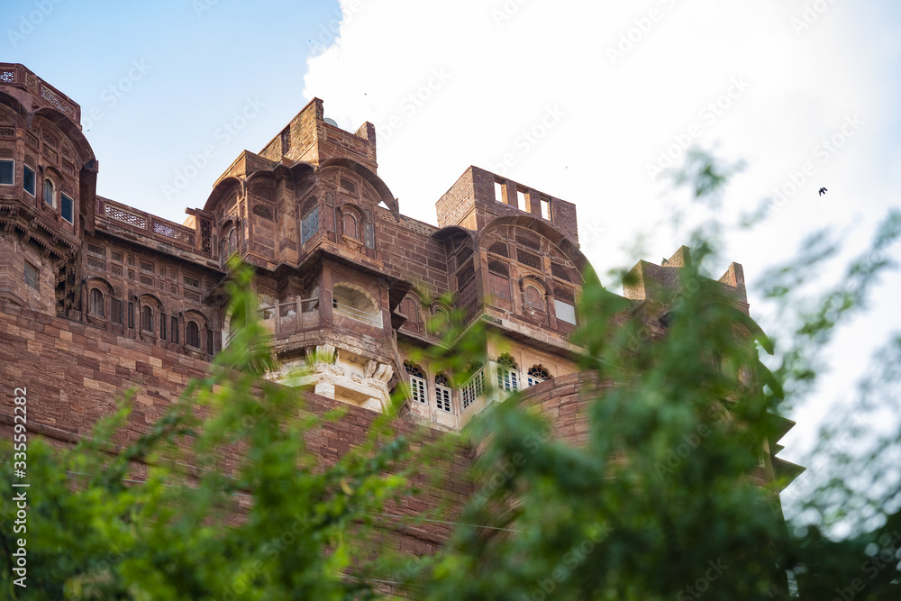 (Selective focus) Stunning view of the ancient Mehrangarh Fort during a beautiful sunny day. Jodhpur, Rajasthan, India. Mehrangarh (Mehran Fort) is one of the largest forts in India.