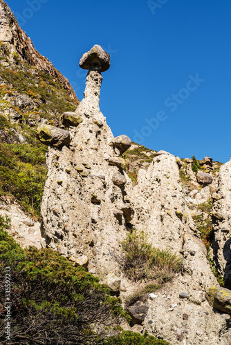 Stone mushrooms, wind erosion of rocks. Russia, Altai Republic, Ulagansky district, Chulyshman valley, Akkurum tract photo