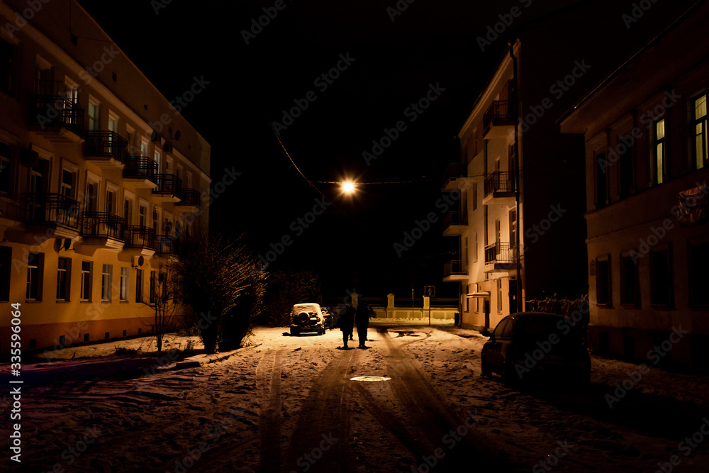 Yaroslavl, Volkova street / Russia - 4 January 2020: Dark night street in old town of Yaroslavl.