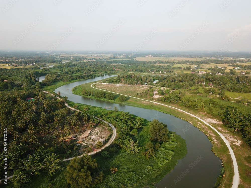 Aerial view Sungai Perai and green cultivation land.