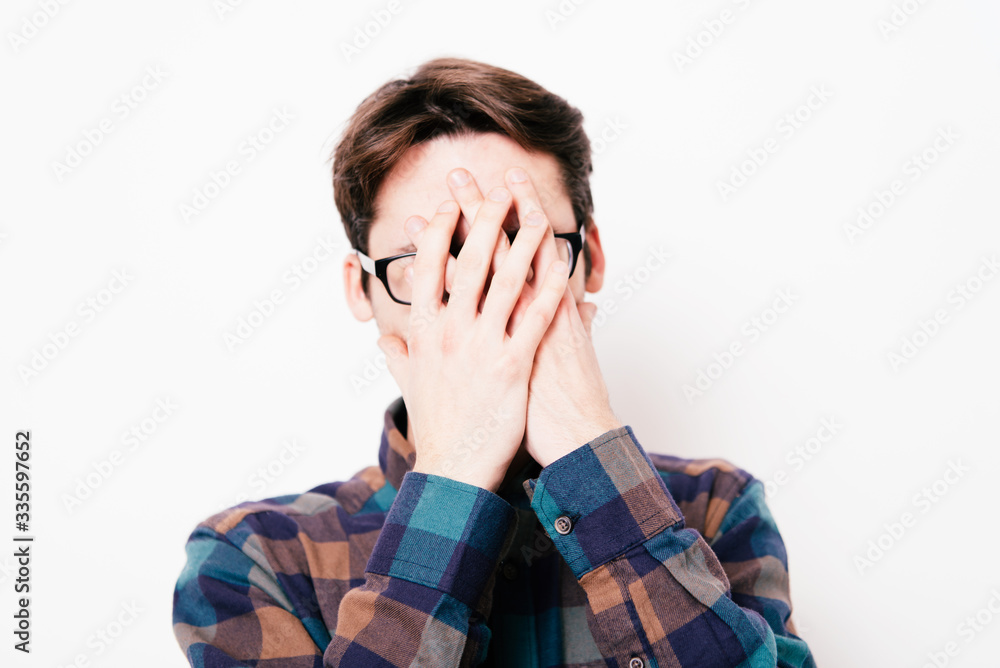 man covered his face with his hands man covered his face with his hands