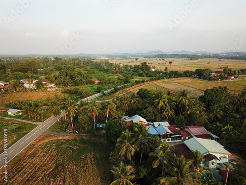 Traditional Malays village at paddy field. © Cloudyew