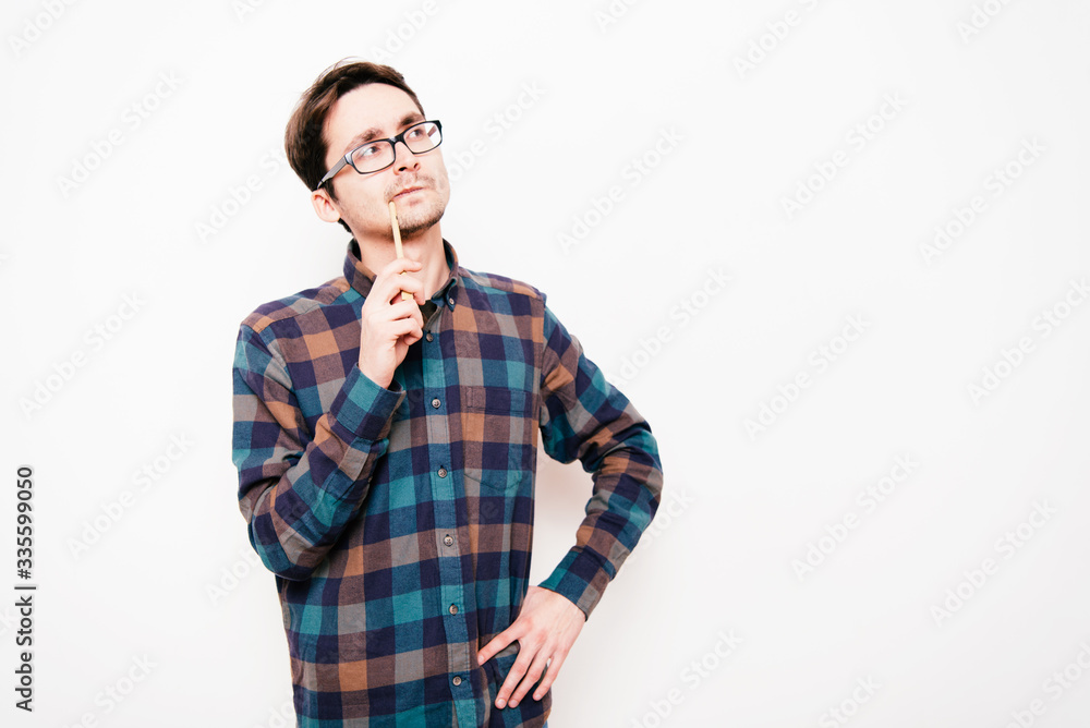 man is thinking about something with pencil man is thinking about something with pencil