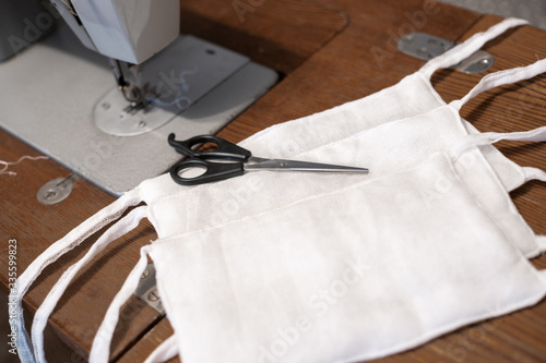 sewing medical protective gauze masks with your own hands on a sewing machine, lack and lack of personal protective equipment