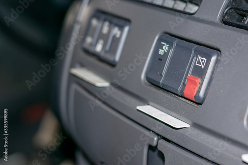 Circuit breaker switch inside the cab of a truck, mandatory for dangerous goods.