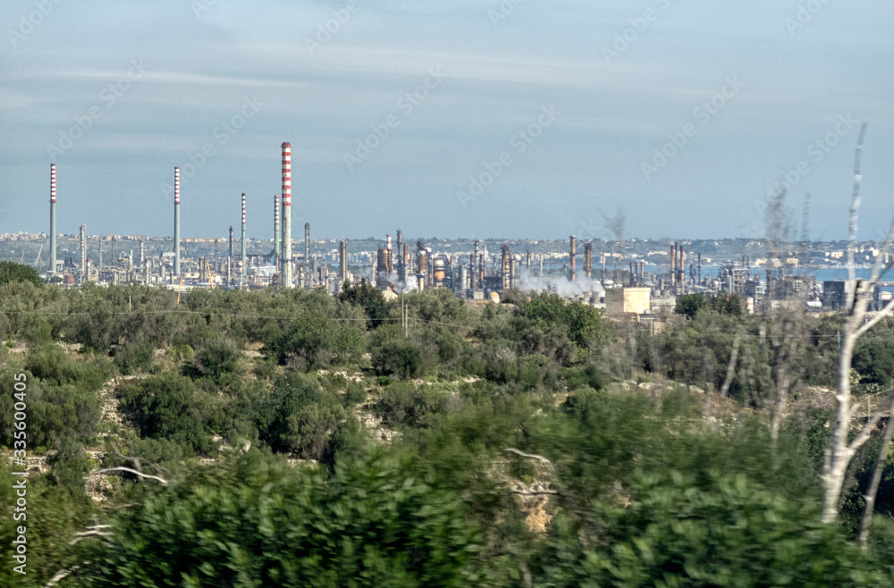 refinery on the seashore, the general plan.
 oil and gas petrochemical industrial, Refinery factory oil storage tank and pipeline steel.