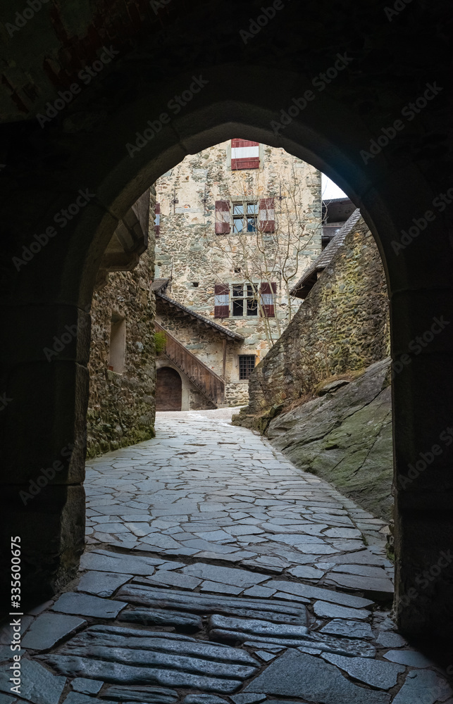 Fototapeta premium The entrance to the castle of Tures (Burg Taufers). One of the most interesting medieval castles in the province of Bolzano. Here the legend of Margarethe von Taufers is set. South Tyrol, Italy.