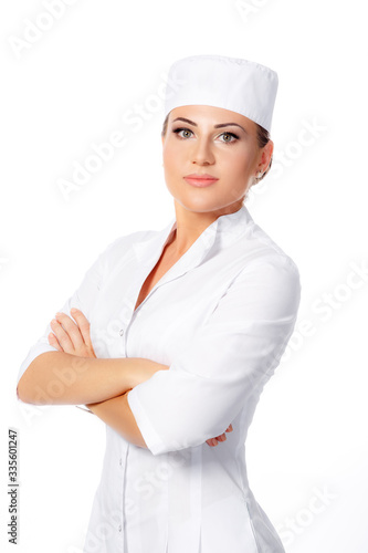 Portrait of a girl doctor on a white background. beautiful girl. treatment of people