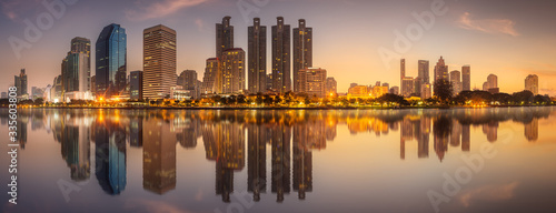 Skyline at lake in Benjakitti park Bangkok