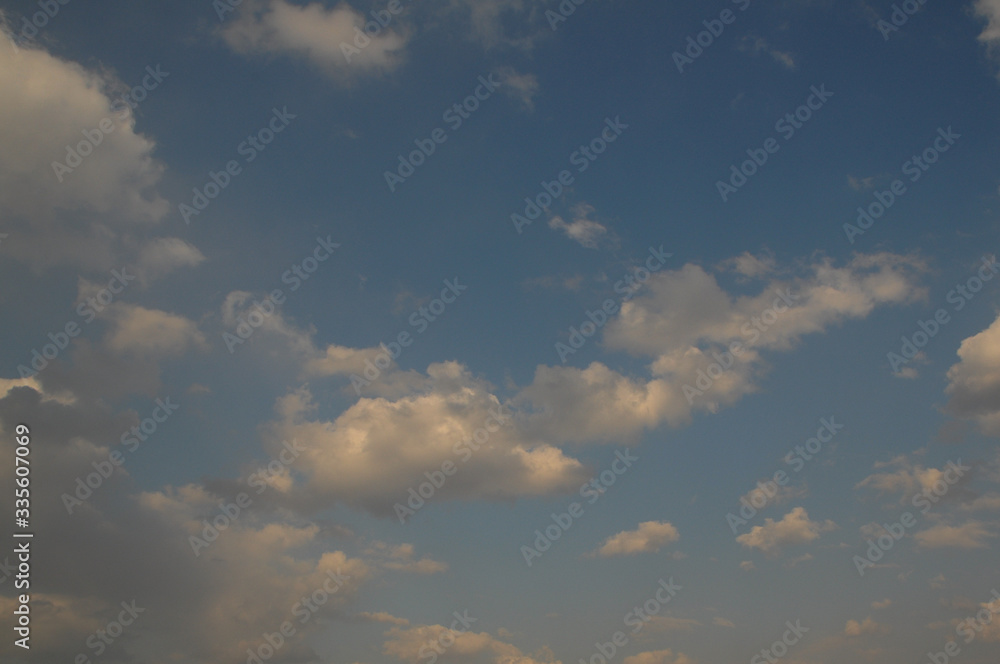blue sky and small clouds in the right corner of the image blue sky and small clouds in the right corner of the image