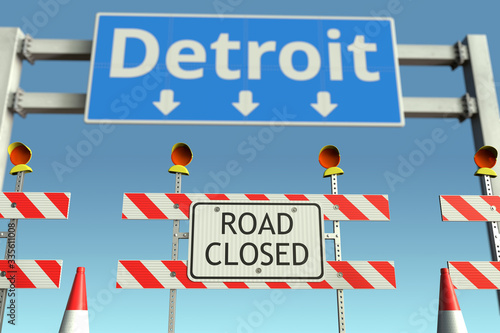 Roadblock near Detroit city road sign. Coronavirus disease quarantine or lockdown in the United States conceptual 3D rendering © Alexey Novikov