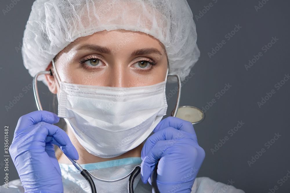 Nurse with phonendoscope, mask and cap. Nurse with phonendoscope, mask and cap.