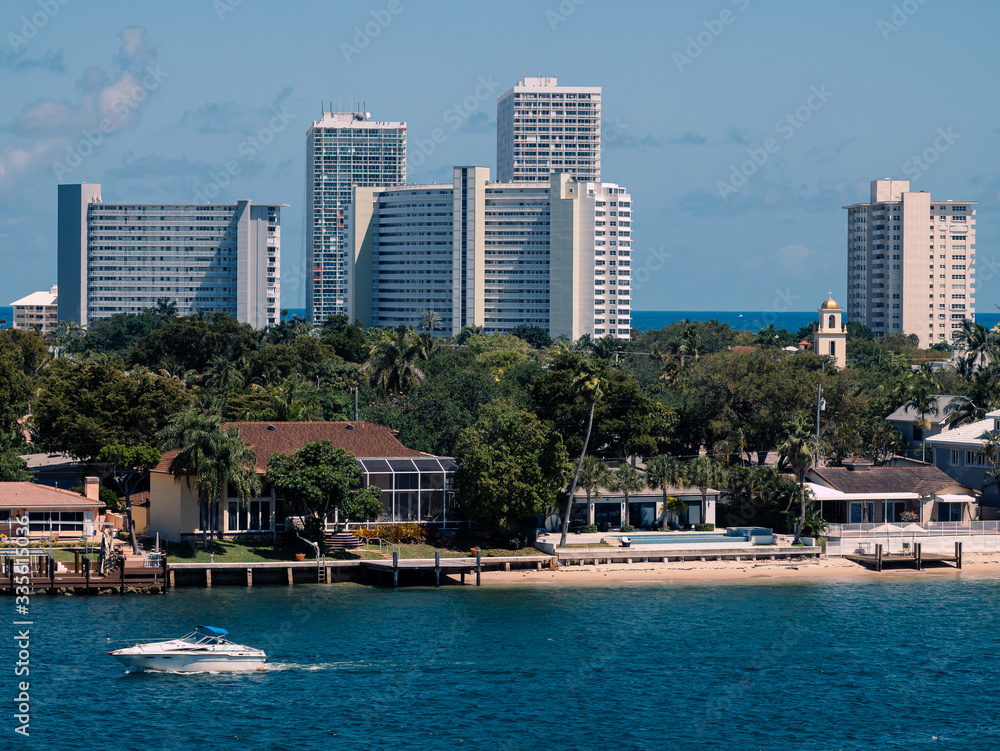 Miami, USA - March 29,2020: casual view on the buildings and streets near port Everglades at sunny weather