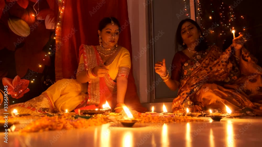 Two beautiful Indian Bengali women in Indian traditional dress