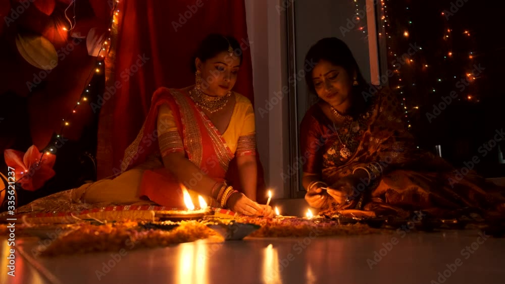 Two beautiful Indian Bengali women in Indian traditional dress