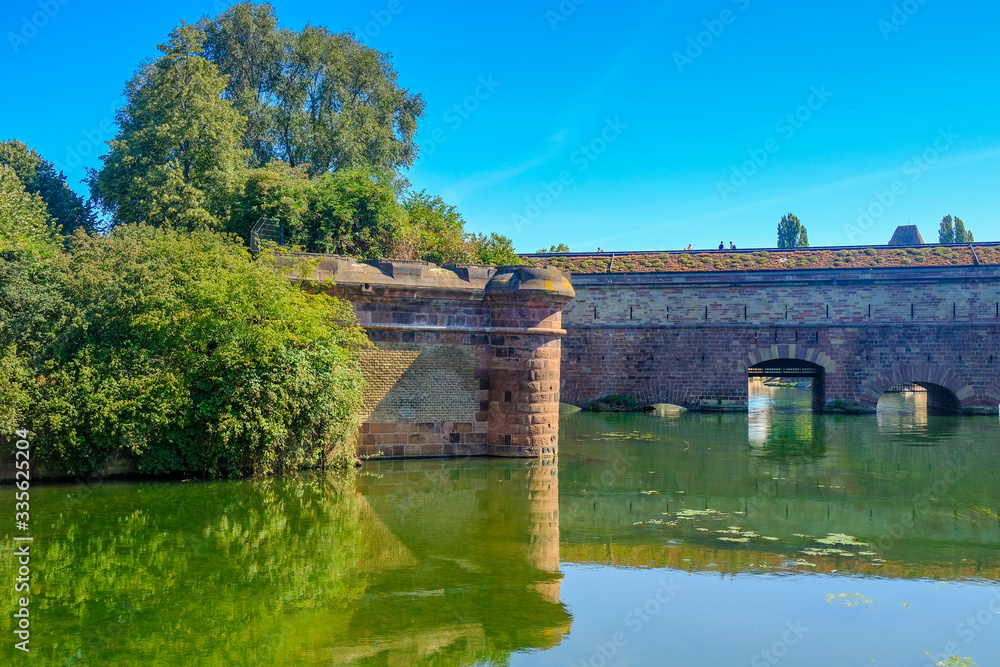 Strasbourg, France. Old bridge Barrage Vauban over the Ill river, Alsace.