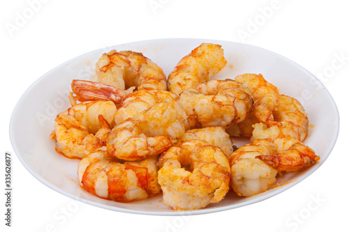 delicious appetizing prawns on white plate on white