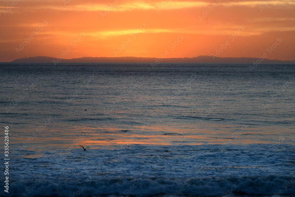 Sunrise or sunset at the beach with a colorful scky Sunrise or sunset at the beach with a colorful scky