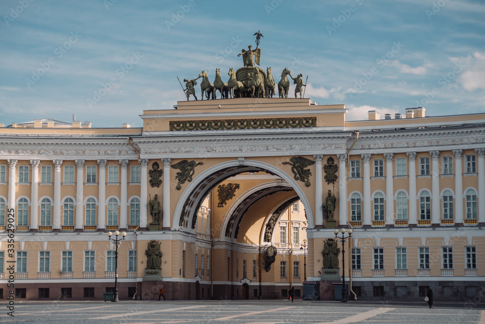 Arch of the main headquarters in Saint Petersburg, Russia during the coronavirus pandemic in April 2020. Empty street.