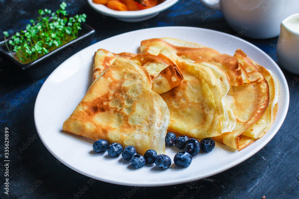 crepes Tasty dessert thin pancakes, healthy breakfast menu concept. background. top view. copy space for text crepes Tasty dessert thin pancakes, healthy breakfast menu concept. background. top view. copy space for text