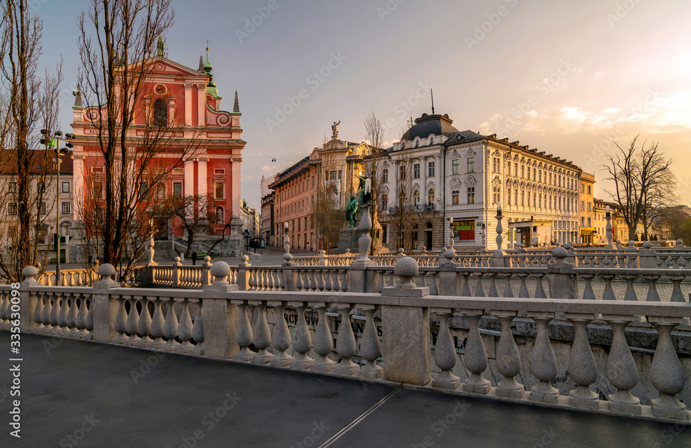 Triple bridges and Franciscan church, lit by morning light, Ljubljana, Slovenia