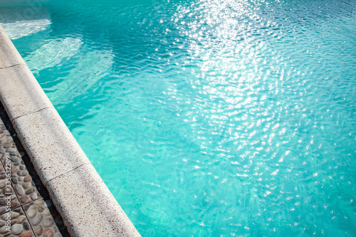 A Pool with steps near the sea. Travel vacation in the park. Vacation background. © Kostia