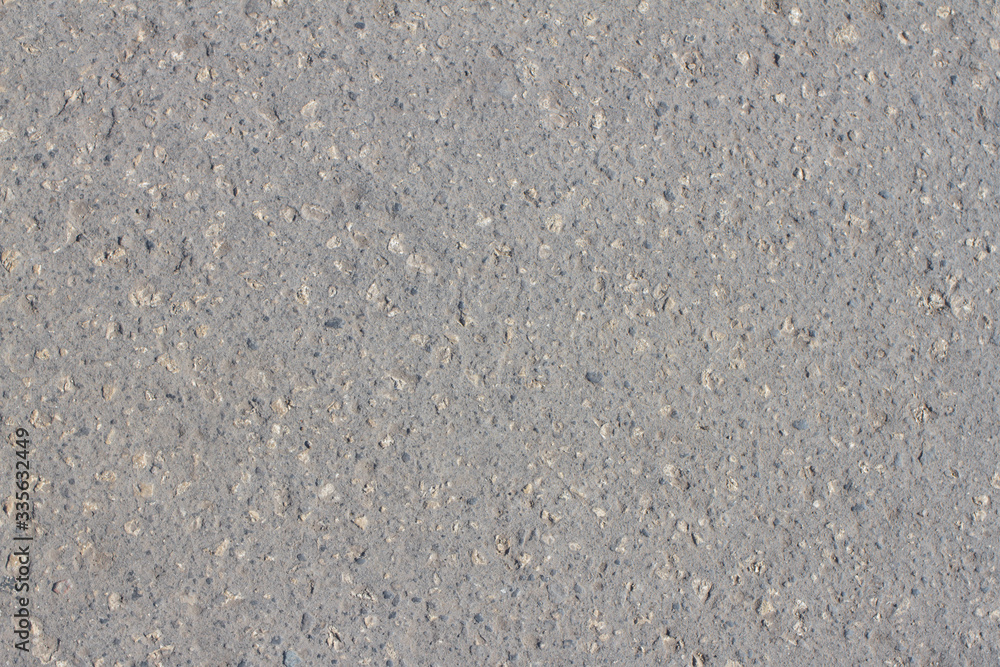 Texture of gray asphalt with dust and stones Texture of gray asphalt with dust and stones