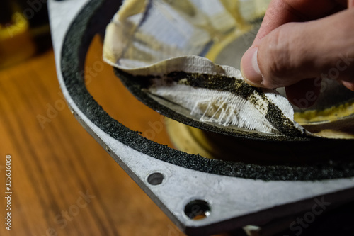 woofer 75gdn-3 sealed with adhesive plaster. Repair and restoration of the speaker.
